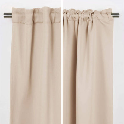 Pair of beige curtains on a white background
