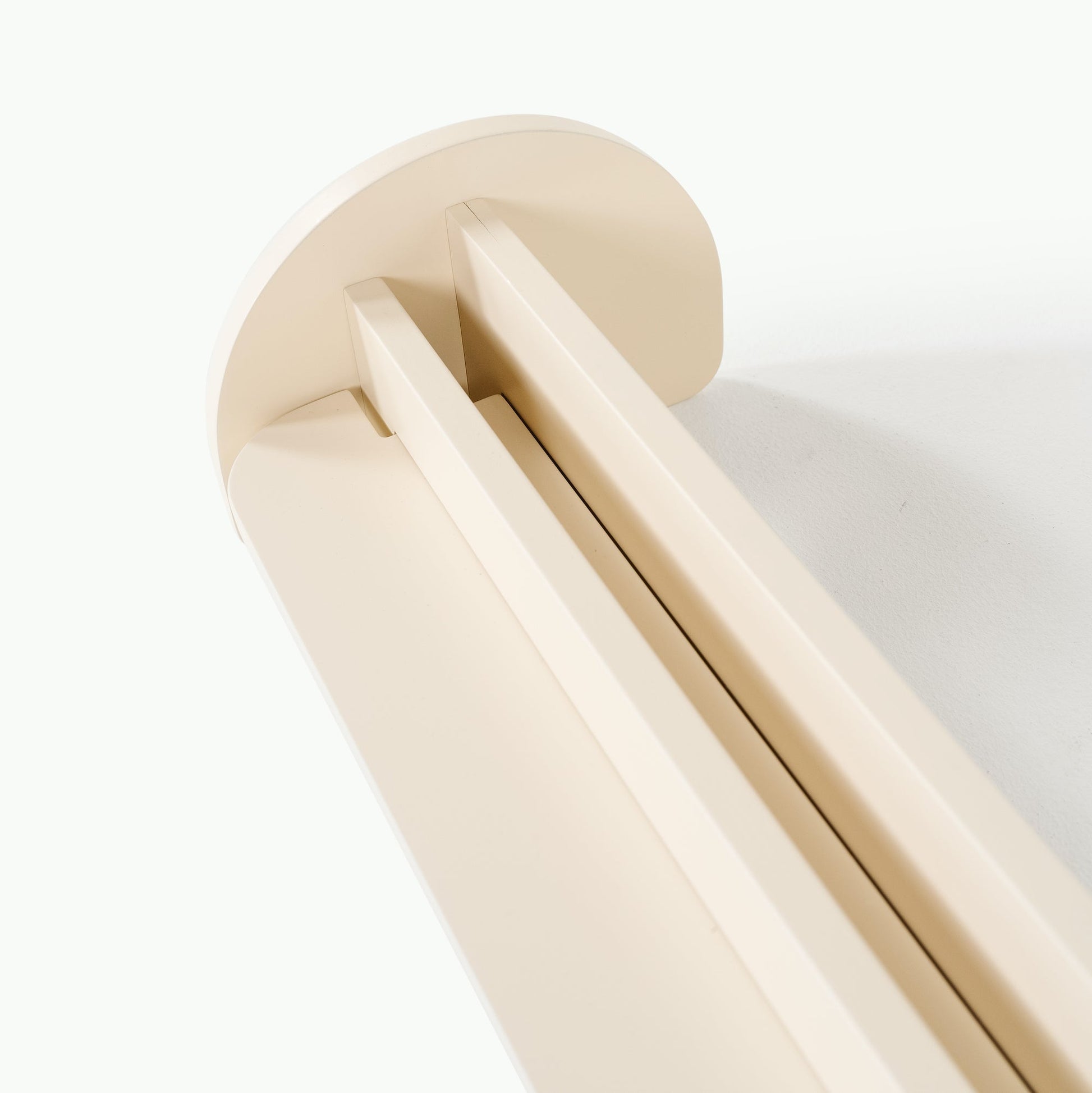 Beige towel bar on a white background